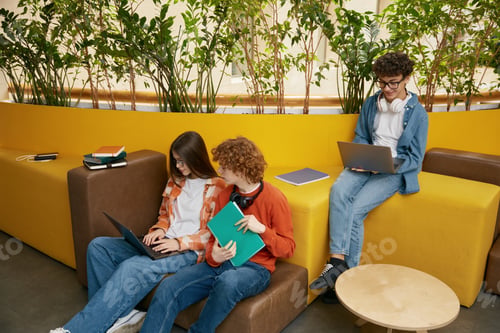 Preview: Group of teenagers in coworking office