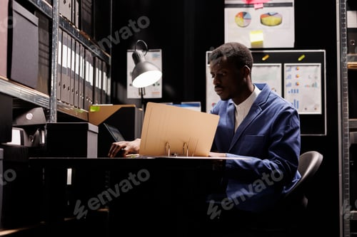 Preview: Employee working at accountancy record