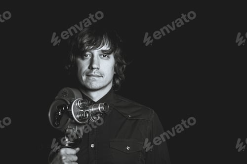 Preview: Retro Movie Camera. Guy Takes On A Retro Movie Camera. Black And White Photography.
