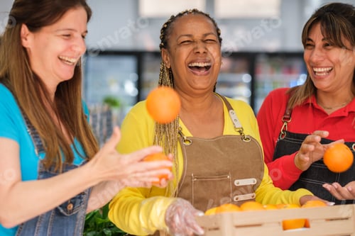 Preview: Middle-aged women carrying a crate of oranges