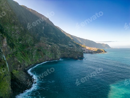 Preview: Stunning coastal landscape featuring cliffs surrounded by tranquil waters. Madeira, Portugal