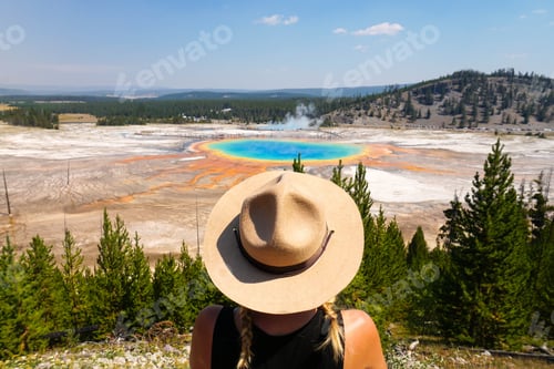 Preview: Woman standing in front of grand prismatic spring