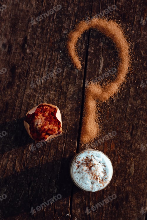 Preview: Cupcake near question mark and coffee
