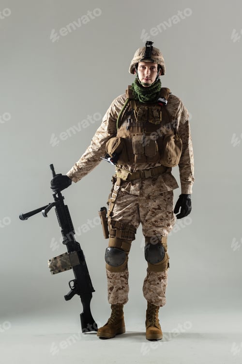 Preview: Soldier in full uniform stands with rifle, showcasing military gear and readiness for action