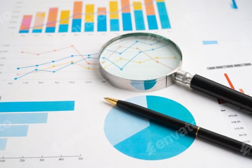 Preview: Magnifying glass on spreadsheet and graph paper. Financial development, Banking Account, Statistic