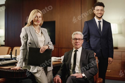 Preview: Group of Experienced Attorneys Posing in Conference Room