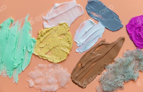 Preview: Different smears of cosmetics. Selective focus. Wet.