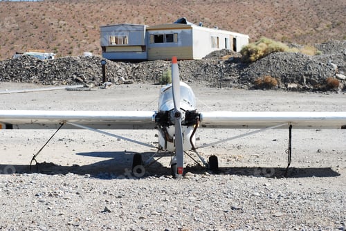 Preview: Closeup view of an old broken propeller of a small white helicopter