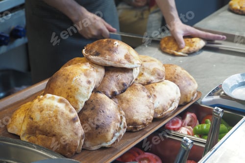 Preview: Freshly Baked Bread is Beautifully Displayed in a Culinary Setting