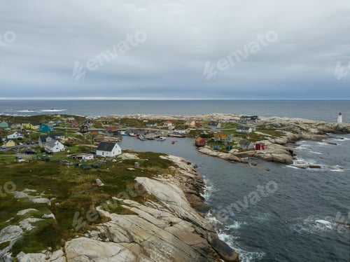 Preview: Aerial view of a small town near a rocky coast on the Atlantic Ocean