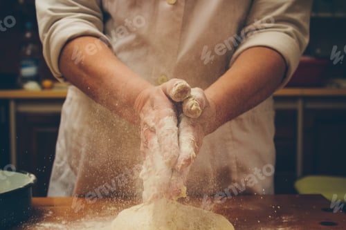 Preview: Chef kneading homemade bread. Retro colors