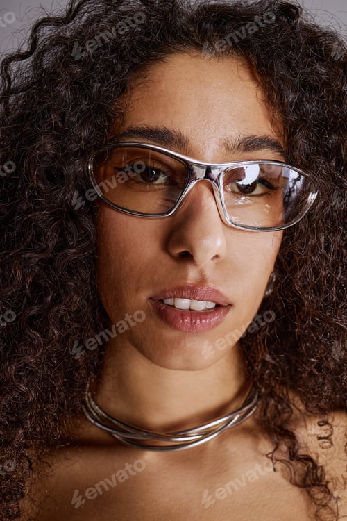 Preview: Portrait of Young Woman Wearing Glasses during Photoshoot