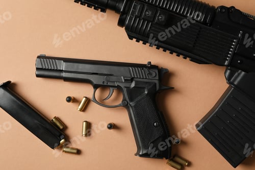 Preview: Composition with weapon on beige background, top view