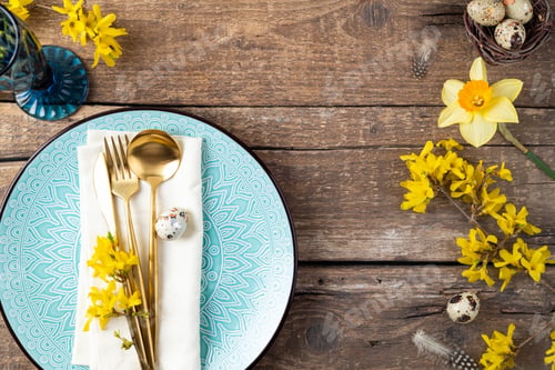 Preview: Holiday table setting with Easter decorations, spring flowers and gold cutlery