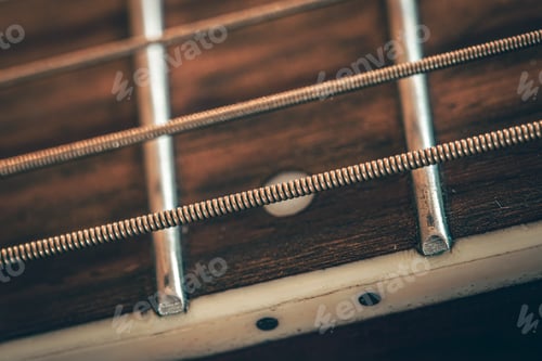 Preview: Acoustic guitar neck, macro shot, guitar detail.
