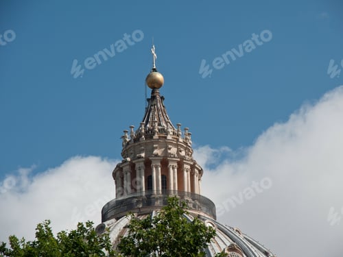 Preview: Golden cross and the architectural detail on the dome of the Saint Peter's Basilica in the Vatican