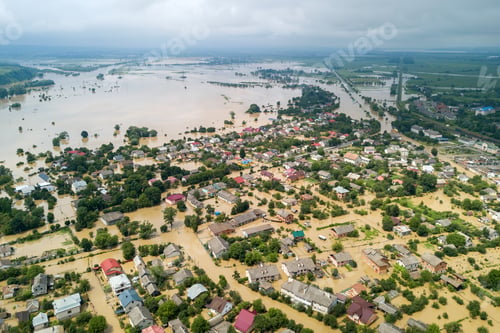 Preview: Aerial view of flooded houses with dirty water of Dnister river in Halych town, western Ukraine.