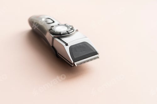 Preview: simple single abstract hair clipper isolated on the color background, barbershop accessory