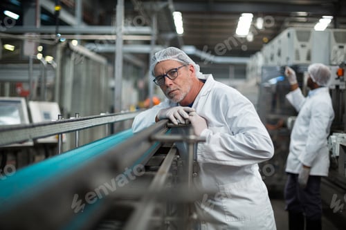 Preview: Factory engineer monitoring production line