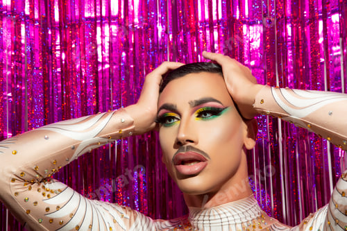 Preview: young man makeup drag queen performer with colorful background