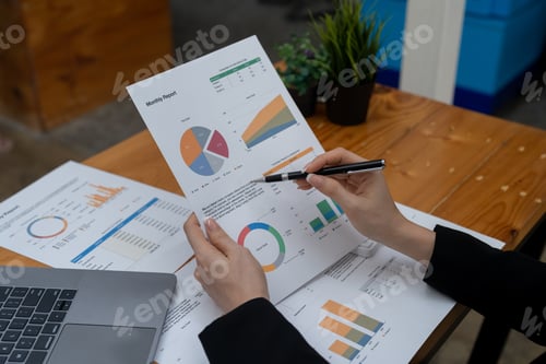 Preview: Businesswoman working make an account analysis report. financial and tax system concept
