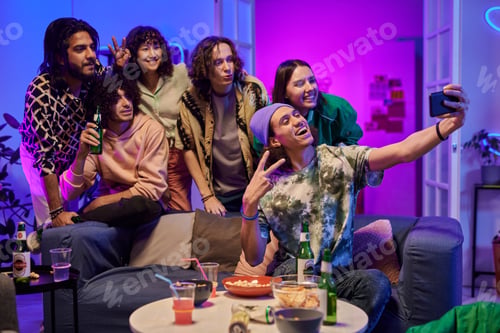 Preview: Large group of happy young intercultural friends taking selfie
