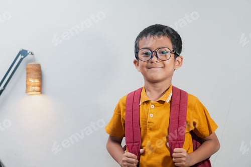 Preview: Confident Boy with Backpack in Modern Interior