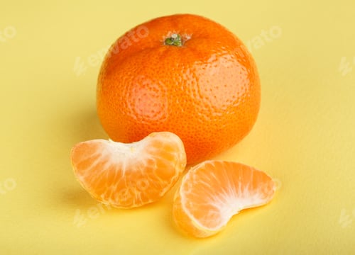 Preview: Ripe Mandarin Close-Up On A White Background. Tangerine Orange. Colorful Food And Drink Still Life