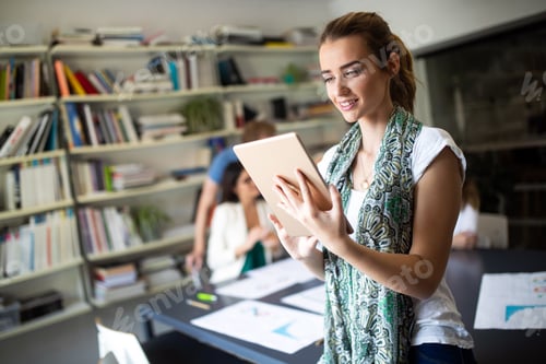Preview: Business woman with her staff, coworker people group in background at office
