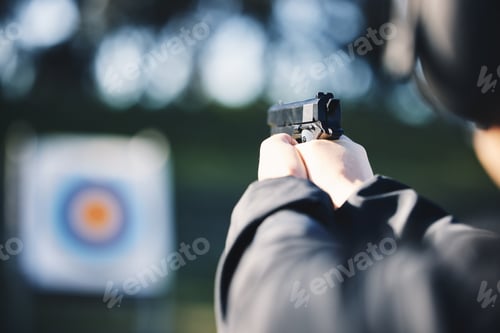 Preview: Gun, target and person training outdoor for shooting range, game exercise or sports event closeup.