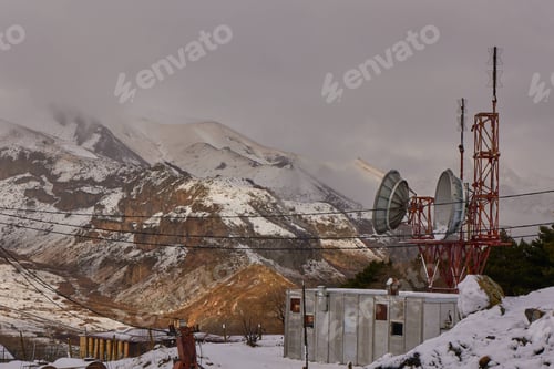 Preview: Group of antennas covered in a light dusting of snow in Georgia, Stepantsminda