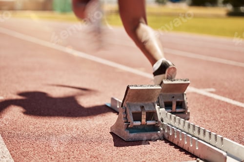Preview: Sports, fitness and running with a starting block on a track for a competitive race in a stadium or