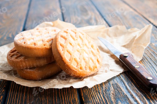 Preview: cookies on dark old wooden table