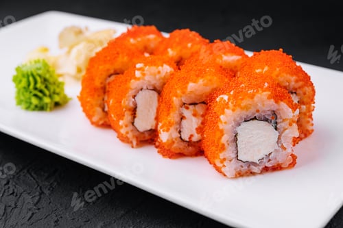 Preview: Macro shot of california maki sushi rolls with rice