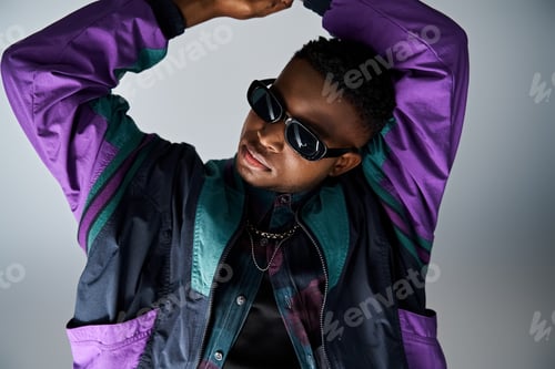 Preview: Stylish Man in Purple Jacket Strikes a Pose