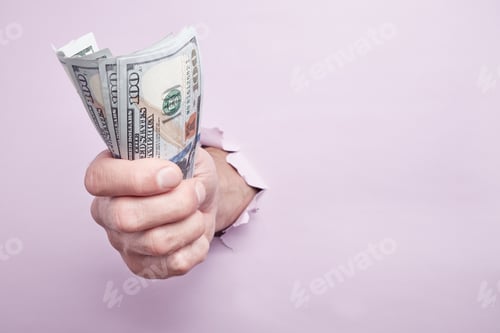 Preview: Hand giving money through a hole