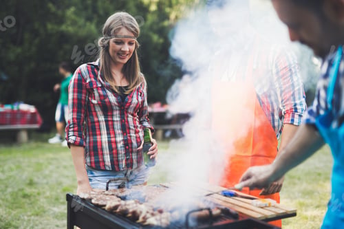 Preview: Happy people having camping and having bbq party