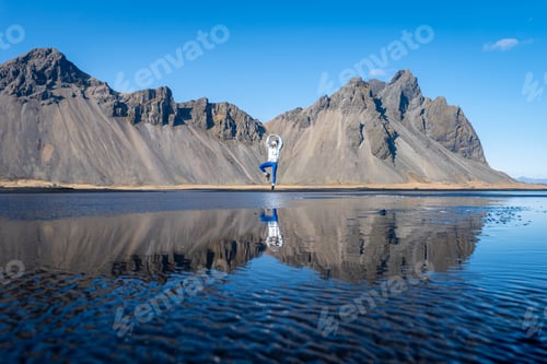 Preview: Woman posing on Stokksnes beach, Iceland