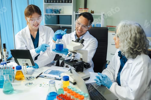 Preview: Scientist mixing chemical liquids in the chemistry lab.