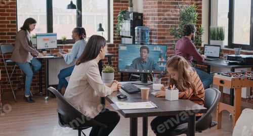 Preview: Business woman meeting colleague on video call