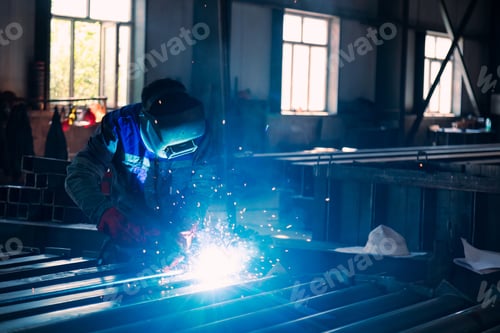 Preview: Industrial welder welding metal profiles