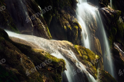 Preview: Details of a waterfall with moss aroung