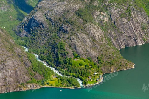 Preview: Tranquil lake surrounded by beautiful lush green mountain