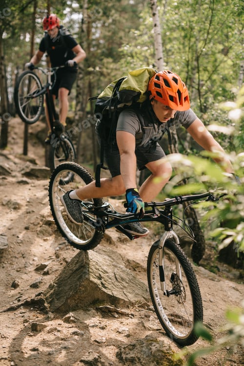 Preview: young trial bikers outdoors