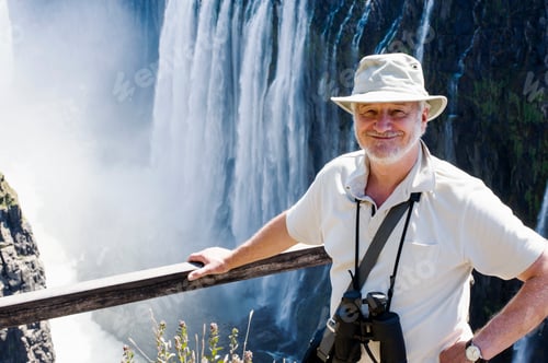 Preview: Portrait of senior man at Victoria Falls, Zambia