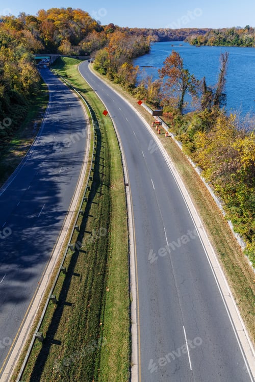 Preview: Autumn landscape with asphalt road in the suburbs of Washington, D.C.