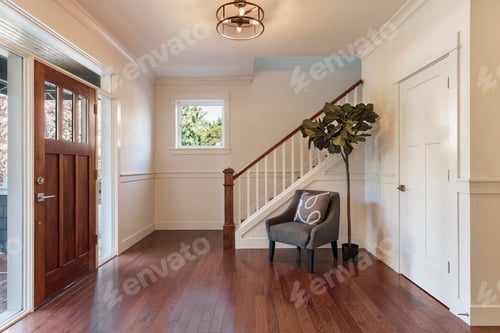 Preview: Armchair and tree in house entryway