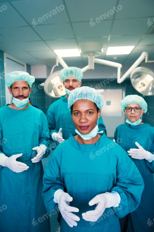 Preview: Medical Team Poses in Teal Surgical Scrubs