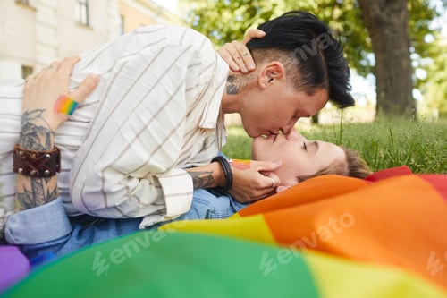 Preview: Women kissing in the park