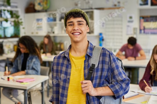 Preview: Portrait of smiling student guy at high school